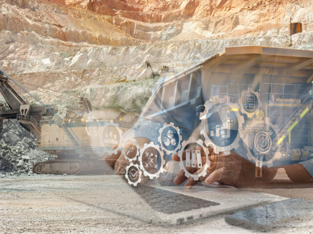 Electric rope shovel and dump truck at a copper mine in Peru
